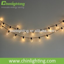 Holiday decorated string lights G40 Edison filament bulbs Warm white color