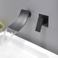 Wall mounted hot and cold bath taps