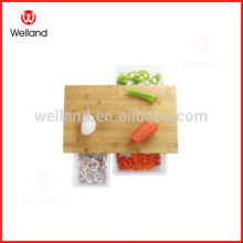 sturdy bamboo cutting board with plastic drawer