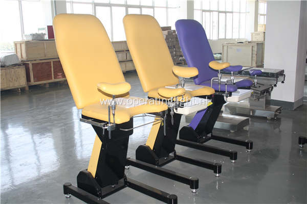 Red color electric gynaecology obstetrics bed