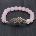 Bracelet de pierres précieuses extensibles avec perles rondes de quartz rose 8MM avec pièce d&#39;aile en alliage Diamante
