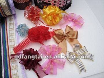 colorful cake decoration flowers and bows