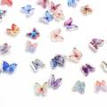 Hot Fashion 100Pcs / Tasche Harz Nagel Schmetterling 3D Maniküre Kunst Aufkleber Schmetterling Charme 8MM 3D Harz Schmetterling Nail Art Dekorationen