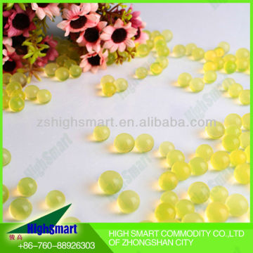 Yellow and golden aqua gel beads for fresh flower arrangements