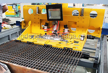 Steel grating making machine for drainage channel