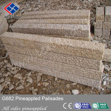 G682 palisade stone fence