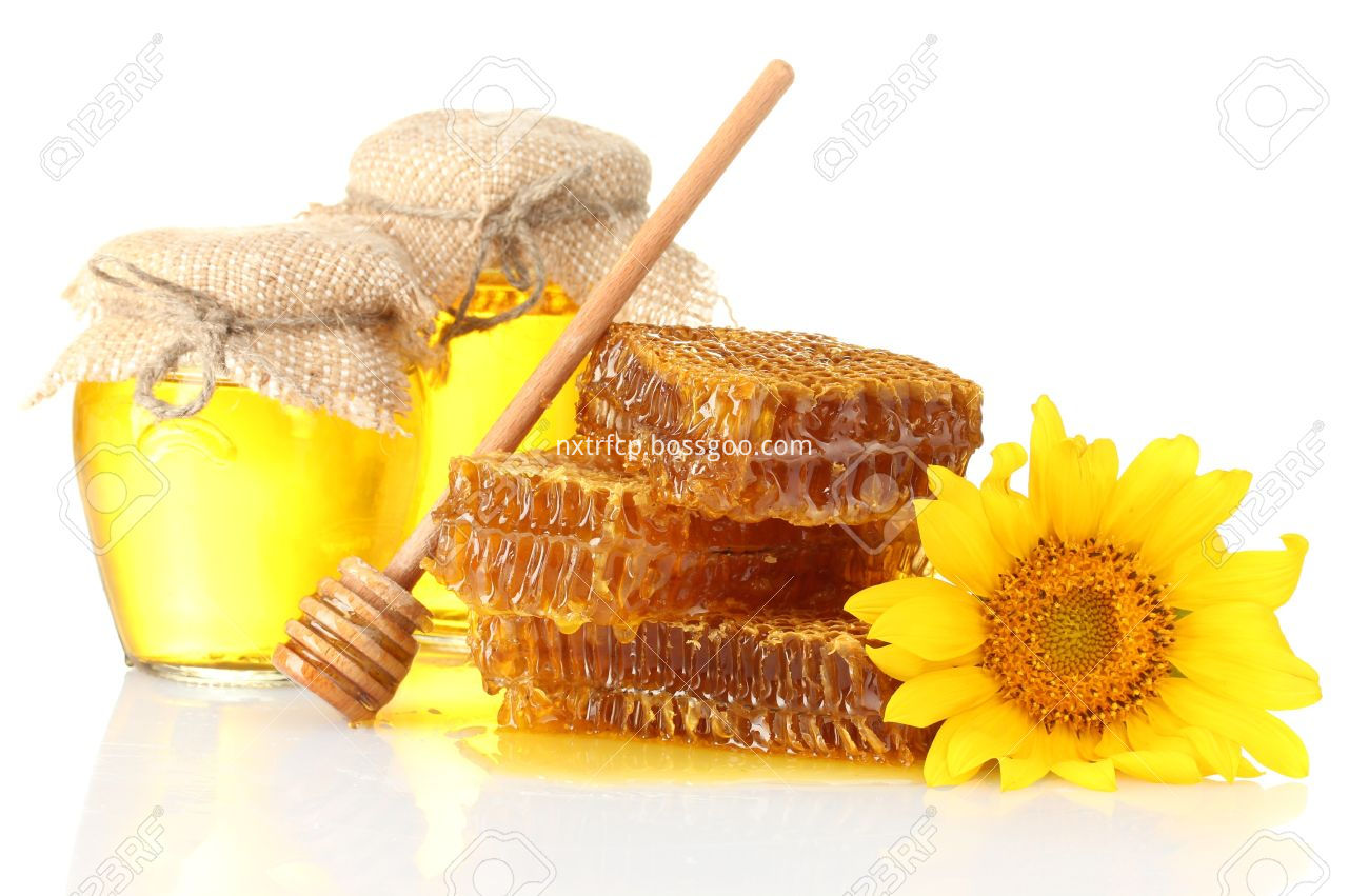 14794363 Sweet Honeycombs Jars With Honey Wooden Drizzler And Sunflower Isolated On White Stock Photo