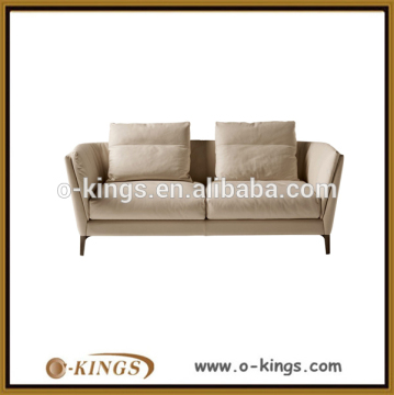 Cream fabric covered 2 seater oak wood sofa