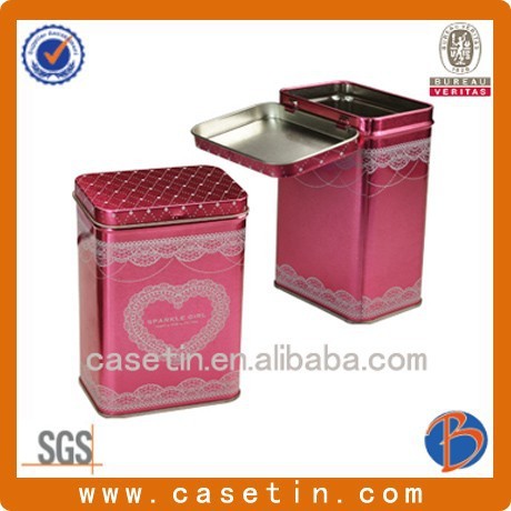 big red rectangular tea packaging tin cans