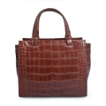 Sac à main en cuir façon crocodile bordeaux