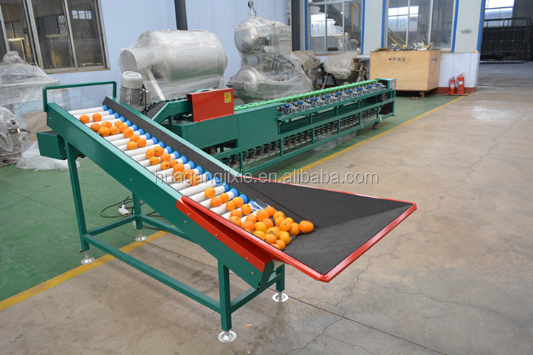 Automatic tomato fruit weight sorter pomegranate sorting machine mandarin and orange grading sorting machine.