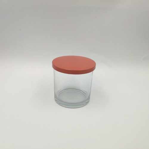 Vaso de vela liso transparente con tapa de metal rosa