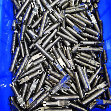 Standard titanium alloy fasteners.