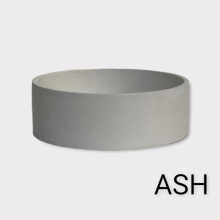 round concrete vessel sink