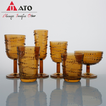 Embossed Amber Colored glass goblet set