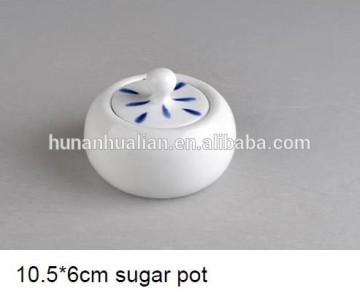 white porcelain sugar pot