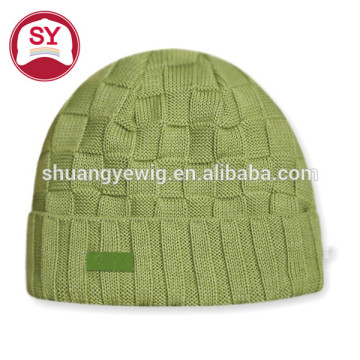 Different kinds of green knit beanie hats