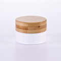 White cream jar with bamboo lid