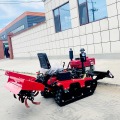 traktor crawler dengan sekop depan