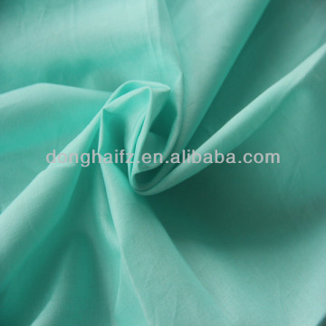 green textile fabric textile