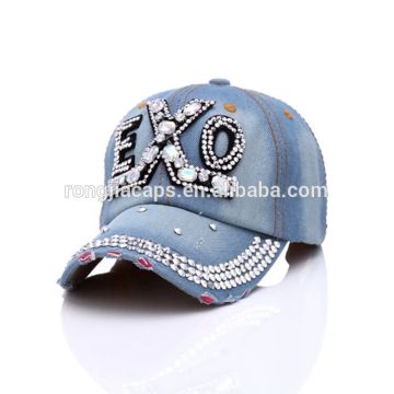 Blue wahed jeans cap with rhinestone