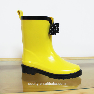 yellow cool kids rubber rain boots with bow