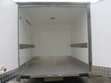 Rear door lock with inner emergency opener