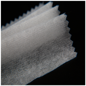 Soft and smooth feeling fusible nonwoven interlining fabric
