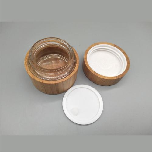 Bouteille de crème cosmétique en bambou avec intérieur en plastique