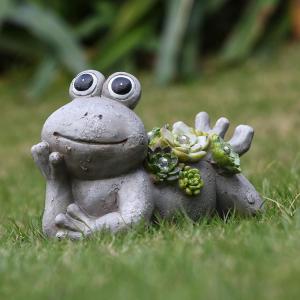 Kikker tuin beelden met op zonne -energie aangedreven lichten