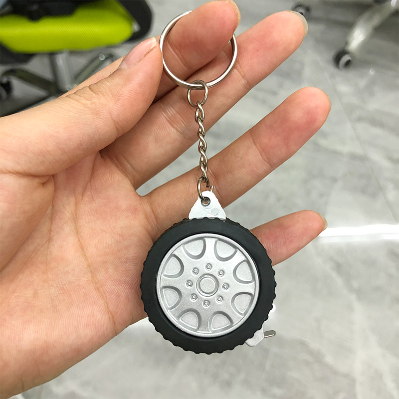 Custom logo printed tire shape measuring tape advertising plastic keychain with mini steel tape measure for promotional gift