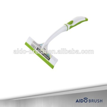 rubber squeegee to clean the window