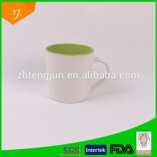 ceramic white mug with colour inside
