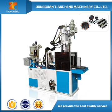 Single slide table vertical injection molding machine