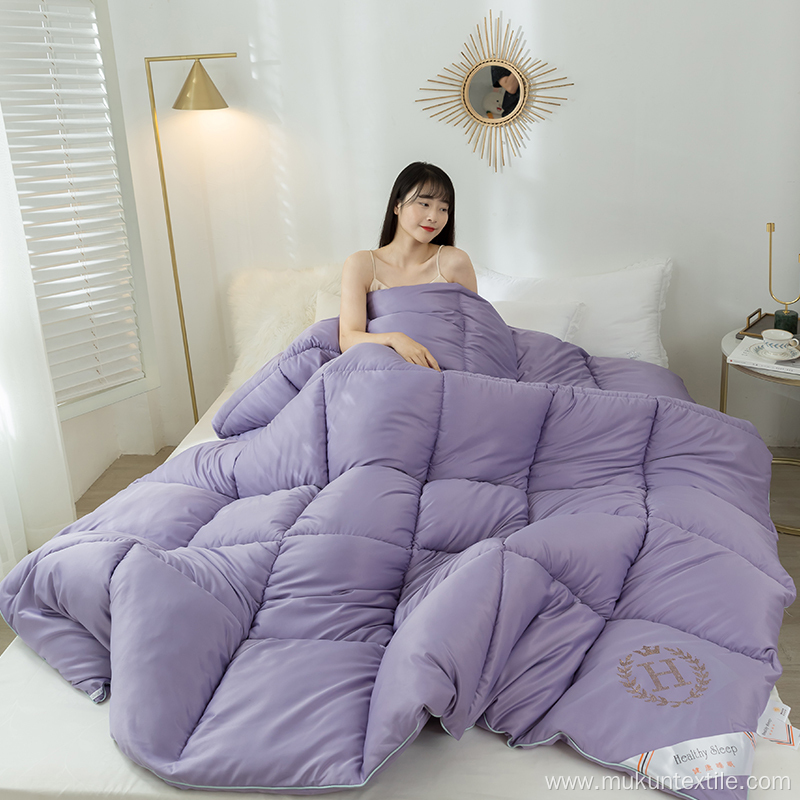 Solid color down alternative filled comforter