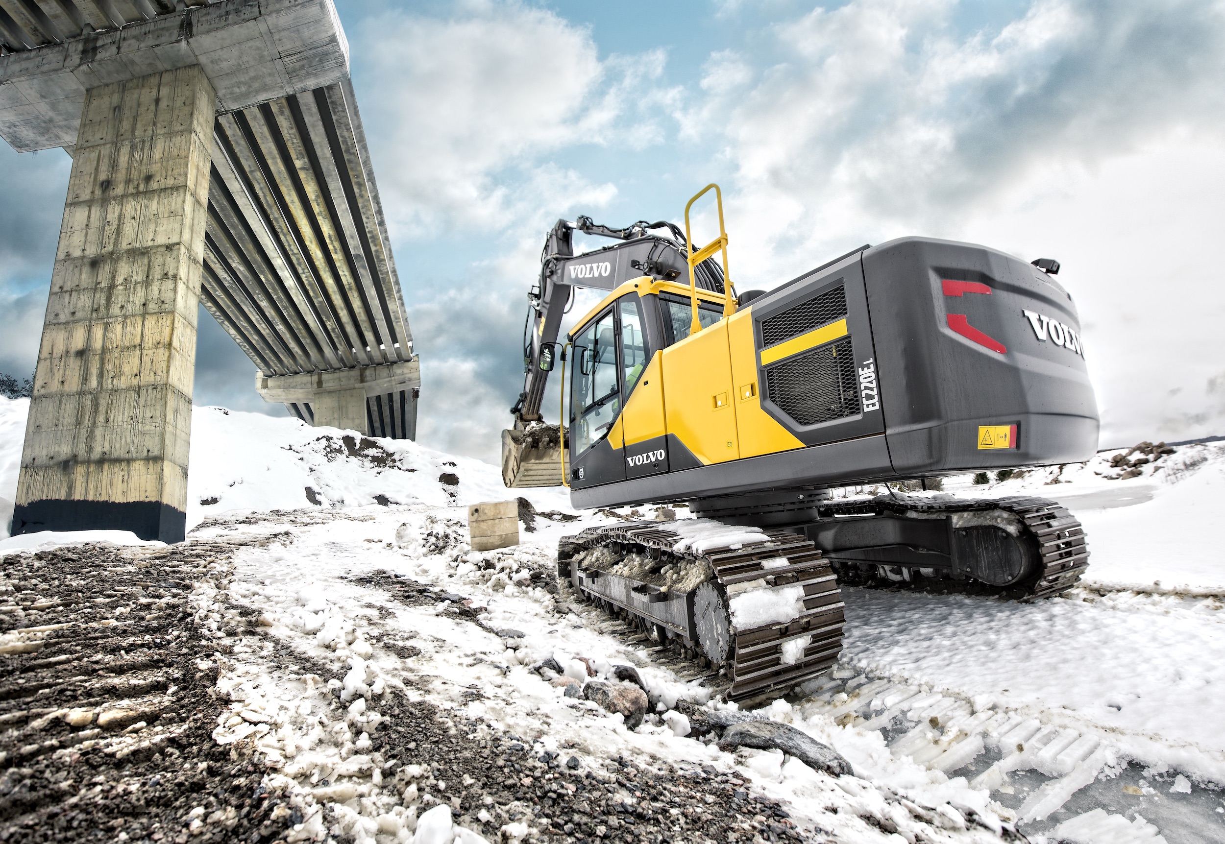 excavator working in snow excavator working in snow