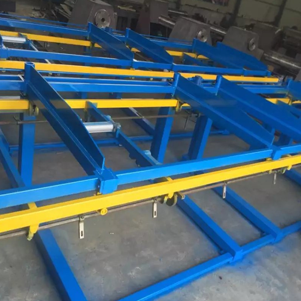 Automatic sheet stacker for roll forming machine