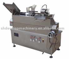 Ampoule filling and sealing machine