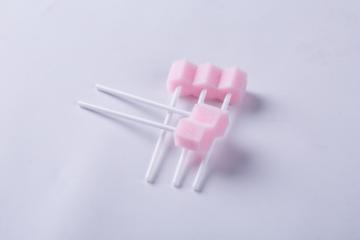 Different treated disposable oral swab sticks