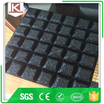 Wet pour tile spacer rubber deck tile