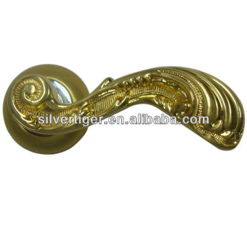 European classic door handle on gold plate