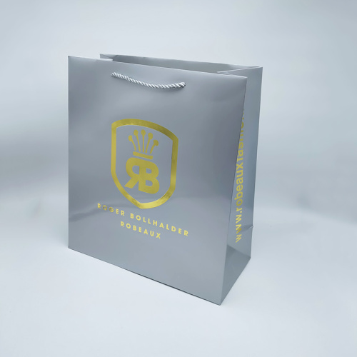 Bolsa de papel de compra de logotipo de lujo de ropa personalizada