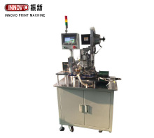 Automatic tag drilling eyelet machine