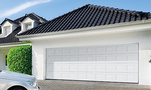 Modern insulated garage door installed in residential project