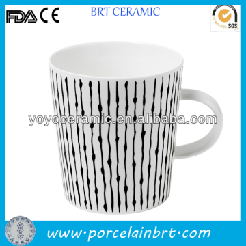 white ceramic coffee mug with small handle