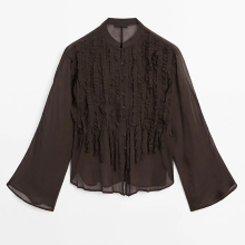 Women's flowing ruffled shirt