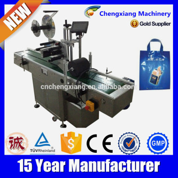 Servo motor Automatic overhead plastic bag label applicator,label machine for bag,plastic bag label applicator