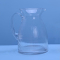 Brocca e tazze in vetro a coste