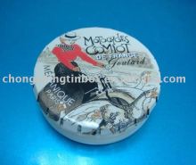 round click-clack tin box