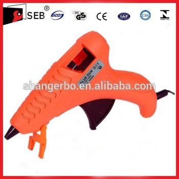 Hand held glue guns for hot melt glue applications